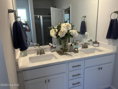 This home was built in 2024; it's practically brand new! The on Harbour Point Golf Club in North Carolina - for sale on GolfHomes.com, golf home, golf lot