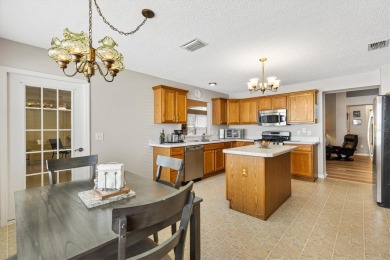 ROOF 2021 HWH 2022 BOND PAID! 4 miles to Sumter Landing!! on The Links of Spruce Creek in Florida - for sale on GolfHomes.com, golf home, golf lot