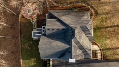 Discover the epitome of lakeside sophistication at this on Links At Lily Creek Resort in Kentucky - for sale on GolfHomes.com, golf home, golf lot