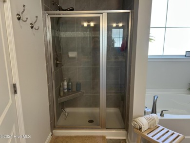 This home was built in 2024; it's practically brand new! The on Harbour Point Golf Club in North Carolina - for sale on GolfHomes.com, golf home, golf lot