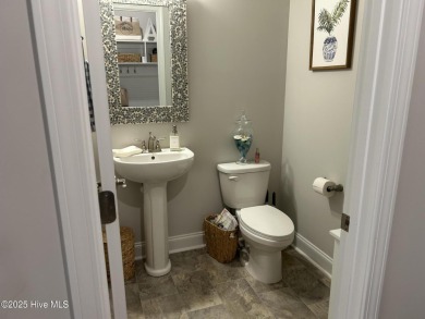 This home was built in 2024; it's practically brand new! The on Harbour Point Golf Club in North Carolina - for sale on GolfHomes.com, golf home, golf lot