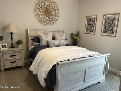 This home was built in 2024; it's practically brand new! The on Harbour Point Golf Club in North Carolina - for sale on GolfHomes.com, golf home, golf lot