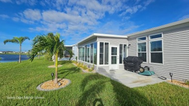 ABSOLUTELY STUNNING! This 2023 Palm Harbor Ventura Model home is on The Riverside Golf Club in Florida - for sale on GolfHomes.com, golf home, golf lot