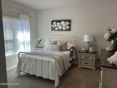 This home was built in 2024; it's practically brand new! The on Harbour Point Golf Club in North Carolina - for sale on GolfHomes.com, golf home, golf lot