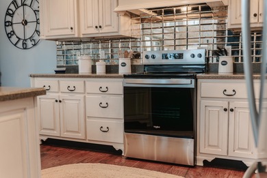 Discover the epitome of lakeside sophistication at this on Links At Lily Creek Resort in Kentucky - for sale on GolfHomes.com, golf home, golf lot