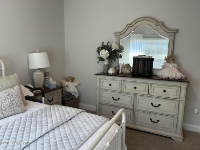 This home was built in 2024; it's practically brand new! The on Harbour Point Golf Club in North Carolina - for sale on GolfHomes.com, golf home, golf lot