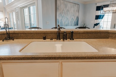 Discover the epitome of lakeside sophistication at this on Links At Lily Creek Resort in Kentucky - for sale on GolfHomes.com, golf home, golf lot