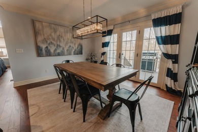 Discover the epitome of lakeside sophistication at this on Links At Lily Creek Resort in Kentucky - for sale on GolfHomes.com, golf home, golf lot