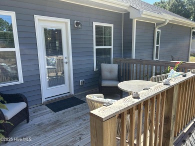This home was built in 2024; it's practically brand new! The on Harbour Point Golf Club in North Carolina - for sale on GolfHomes.com, golf home, golf lot
