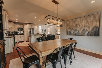 Discover the epitome of lakeside sophistication at this on Links At Lily Creek Resort in Kentucky - for sale on GolfHomes.com, golf home, golf lot