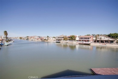 Discover this spectacular lakefront house in the sought-after on Spring Valley Lake Country Club in California - for sale on GolfHomes.com, golf home, golf lot