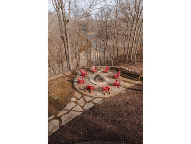 Discover the epitome of lakeside sophistication at this on Links At Lily Creek Resort in Kentucky - for sale on GolfHomes.com, golf home, golf lot