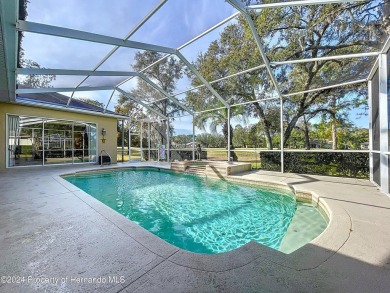 Beautifully situated 3+/3/3 pool home in upscale Silverthorn on Silverthorn Country Club in Florida - for sale on GolfHomes.com, golf home, golf lot