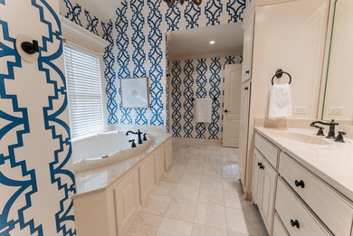 Discover the epitome of lakeside sophistication at this on Links At Lily Creek Resort in Kentucky - for sale on GolfHomes.com, golf home, golf lot