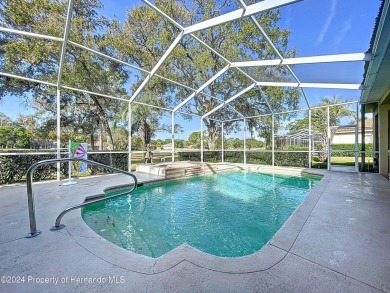 Beautifully situated 3+/3/3 pool home in upscale Silverthorn on Silverthorn Country Club in Florida - for sale on GolfHomes.com, golf home, golf lot