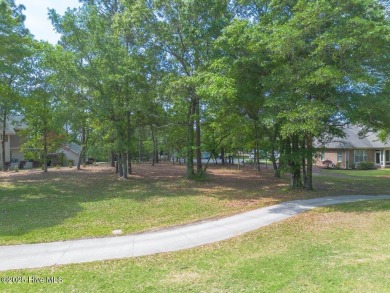 Discover one of the most beautiful homesites in the sought-after on Carolina National Golf Club in North Carolina - for sale on GolfHomes.com, golf home, golf lot