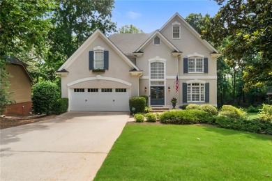 Tucked into a quiet cul-de-sac in sought-after Windward, this on The Golf Club of Georgia in Georgia - for sale on GolfHomes.com, golf home, golf lot