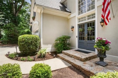 Tucked into a quiet cul-de-sac in sought-after Windward, this on The Golf Club of Georgia in Georgia - for sale on GolfHomes.com, golf home, golf lot