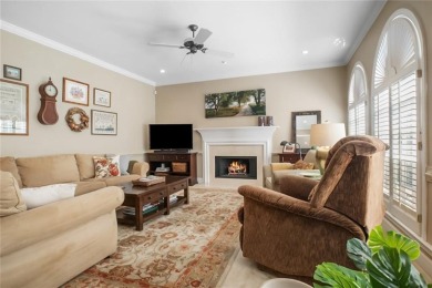 Tucked into a quiet cul-de-sac in sought-after Windward, this on The Golf Club of Georgia in Georgia - for sale on GolfHomes.com, golf home, golf lot