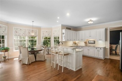 Tucked into a quiet cul-de-sac in sought-after Windward, this on The Golf Club of Georgia in Georgia - for sale on GolfHomes.com, golf home, golf lot