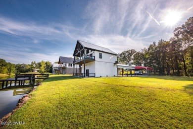 74 Blue Herring Drive offers a harmonious blend of comfort and on  in Tennessee - for sale on GolfHomes.com, golf home, golf lot