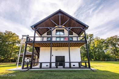 74 Blue Herring Drive offers a harmonious blend of comfort and on  in Tennessee - for sale on GolfHomes.com, golf home, golf lot