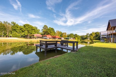 74 Blue Herring Drive offers a harmonious blend of comfort and on  in Tennessee - for sale on GolfHomes.com, golf home, golf lot