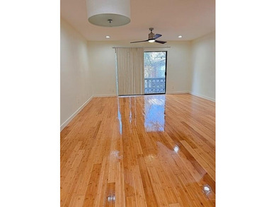 This modern updated condo offers quartz counters, cement tile on Las Colinas Country Club in Texas - for sale on GolfHomes.com, golf home, golf lot