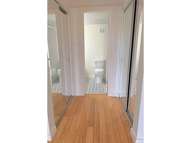 This modern updated condo offers quartz counters, cement tile on Las Colinas Country Club in Texas - for sale on GolfHomes.com, golf home, golf lot