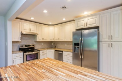 Welcome to this beautifully updated end unit condo located in on Shadow Lake Village in New Jersey - for sale on GolfHomes.com, golf home, golf lot