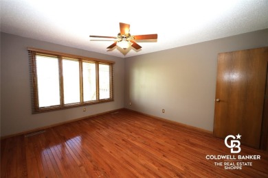 Enjoy peaceful evenings on your covered back deck overlooking on The Golf Club At Southwind in Kansas - for sale on GolfHomes.com, golf home, golf lot