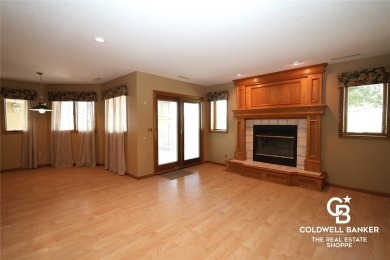 Enjoy peaceful evenings on your covered back deck overlooking on The Golf Club At Southwind in Kansas - for sale on GolfHomes.com, golf home, golf lot