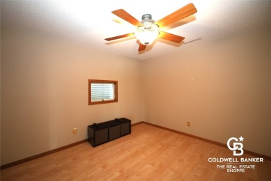 Enjoy peaceful evenings on your covered back deck overlooking on The Golf Club At Southwind in Kansas - for sale on GolfHomes.com, golf home, golf lot