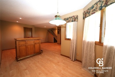 Enjoy peaceful evenings on your covered back deck overlooking on The Golf Club At Southwind in Kansas - for sale on GolfHomes.com, golf home, golf lot