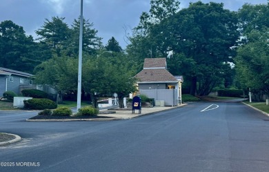 Welcome to this beautifully updated end unit condo located in on Shadow Lake Village in New Jersey - for sale on GolfHomes.com, golf home, golf lot