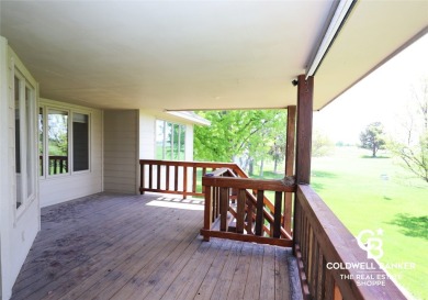 Enjoy peaceful evenings on your covered back deck overlooking on The Golf Club At Southwind in Kansas - for sale on GolfHomes.com, golf home, golf lot