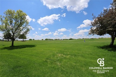 Enjoy peaceful evenings on your covered back deck overlooking on The Golf Club At Southwind in Kansas - for sale on GolfHomes.com, golf home, golf lot