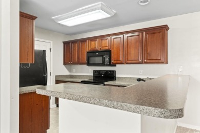 Fantastic opportunity to own this first floor end unit condo on International Club of Myrtle Beach in South Carolina - for sale on GolfHomes.com, golf home, golf lot