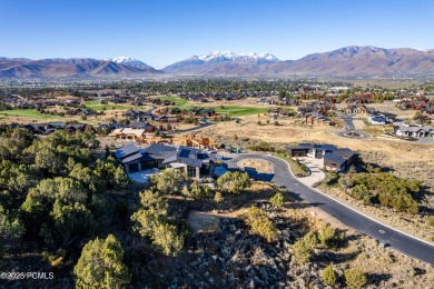 Tucked within a peaceful cul-de-sac in the heart of Red Ledges on Red Ledges Golf Club in Utah - for sale on GolfHomes.com, golf home, golf lot