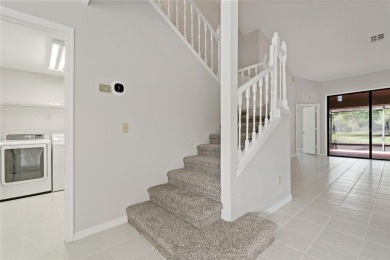 Live Where You Play - Updated Pond-View Home in The Eagles!
 on The Eagles Golf Course and Club in Florida - for sale on GolfHomes.com, golf home, golf lot