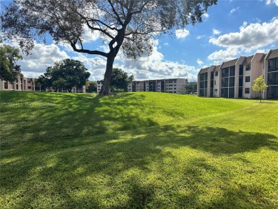 GREAT AND HIGHLY SOUGHT AFTER GROUND FLOOR 2/2 UNIT! ALL TILES on Sunrise Lakes Phase IV Golf Course in Florida - for sale on GolfHomes.com, golf home, golf lot