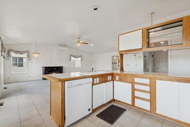 This home and location blends an active leisure lifestyle with on Village Greens Golf Club in Montana - for sale on GolfHomes.com, golf home, golf lot