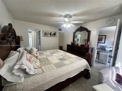 GREAT AND HIGHLY SOUGHT AFTER GROUND FLOOR 2/2 UNIT! ALL TILES on Sunrise Lakes Phase IV Golf Course in Florida - for sale on GolfHomes.com, golf home, golf lot
