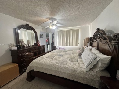 GREAT AND HIGHLY SOUGHT AFTER GROUND FLOOR 2/2 UNIT! ALL TILES on Sunrise Lakes Phase IV Golf Course in Florida - for sale on GolfHomes.com, golf home, golf lot