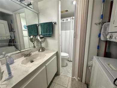 GREAT AND HIGHLY SOUGHT AFTER GROUND FLOOR 2/2 UNIT! ALL TILES on Sunrise Lakes Phase IV Golf Course in Florida - for sale on GolfHomes.com, golf home, golf lot
