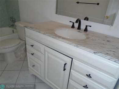 Larger model home in the community of Leisureville. This on Leisureville Community Association in Florida - for sale on GolfHomes.com, golf home, golf lot