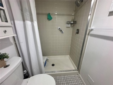 GREAT AND HIGHLY SOUGHT AFTER GROUND FLOOR 2/2 UNIT! ALL TILES on Sunrise Lakes Phase IV Golf Course in Florida - for sale on GolfHomes.com, golf home, golf lot