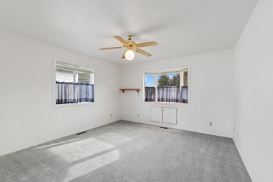 This home and location blends an active leisure lifestyle with on Village Greens Golf Club in Montana - for sale on GolfHomes.com, golf home, golf lot