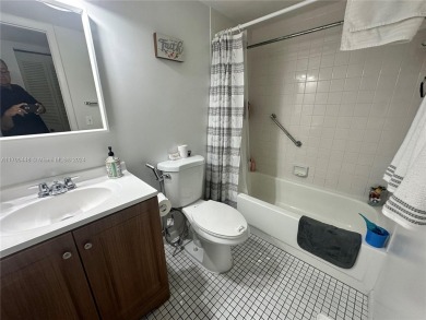 GREAT AND HIGHLY SOUGHT AFTER GROUND FLOOR 2/2 UNIT! ALL TILES on Sunrise Lakes Phase IV Golf Course in Florida - for sale on GolfHomes.com, golf home, golf lot