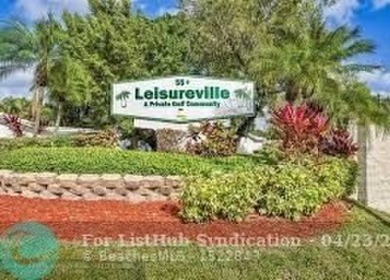 Larger model home in the community of Leisureville. This on Leisureville Community Association in Florida - for sale on GolfHomes.com, golf home, golf lot